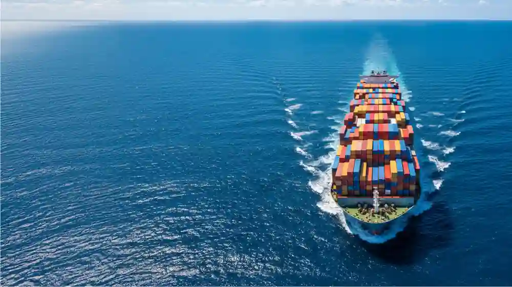 Container ship sailing on open ocean